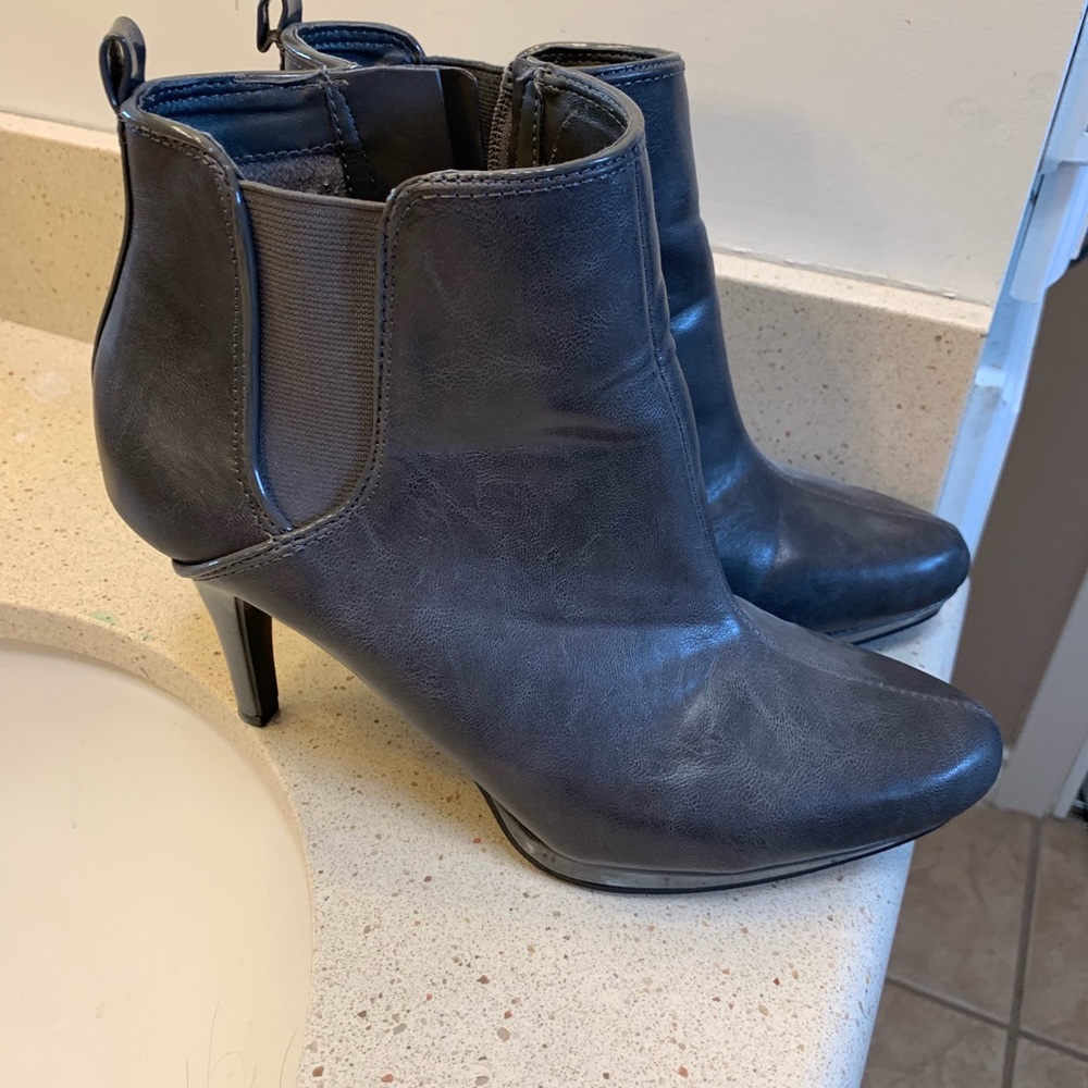 Gray high heel booties.